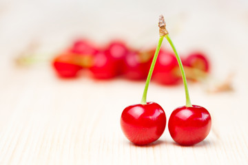 Cherries on wooden table