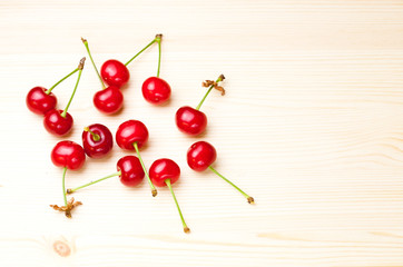 Obraz na płótnie Canvas Cherries on wooden table