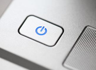 Silver power button close-up