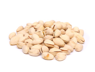 pistachios heap on the white background