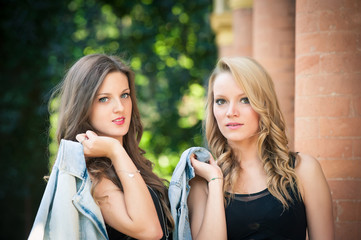 Two beautiful girls outdoors portrait.