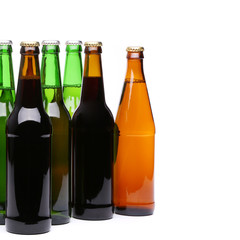 Closed bottles of beer on a white background