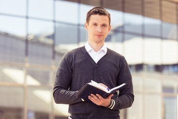 businessman with notepad and pen