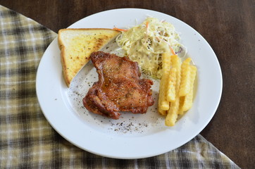 Steak chicken with Frenchfried and salad