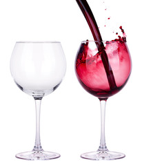 full and empty red wine glass isolated