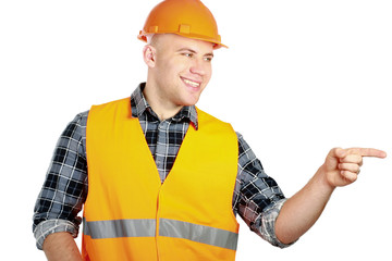 A young construction worker pointing something