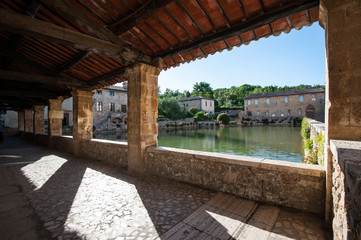 Old thermal baths in the medieval village Bagno Vignoni 
