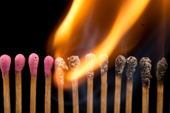Burning matches in a line