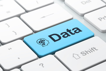 Data concept: Head With Gears and Data on computer keyboard back