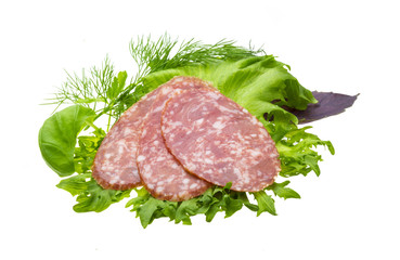 Sausages with salad and basil