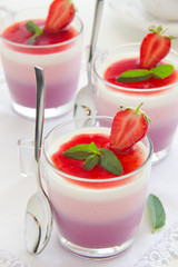 Panna cotta with strawberries and blueberries.
