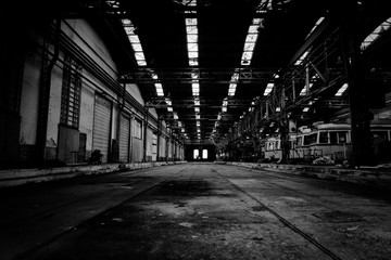 Interior of a vehicle repair station in black and white