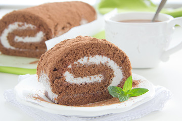 Chocolate roll with cream.