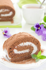 Chocolate roll with cream.