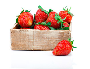 Strawberries berry in the wooden box, isolated on white backgrou