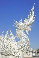 Fototapeta premium Architectural detail of Wat Rong Khun temple in.