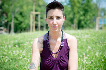 beautiful hipster short hair woman in the park