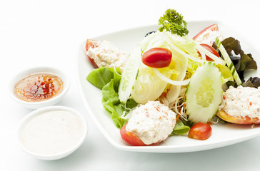 Crab meat salad and mixed green.