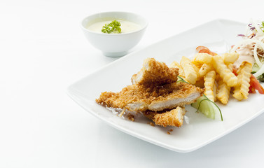 Wiener Schnitzel pork with French fries.
