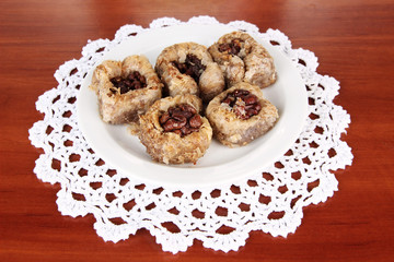 Sweet baklava on plate on table close-up