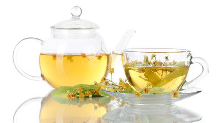 Kettle and cup of tea with linden