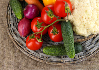 Fresh vegetables on burlap background