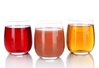 Glasses of fresh juice isolated on white