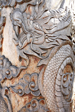Pictures dragon carved from wood.