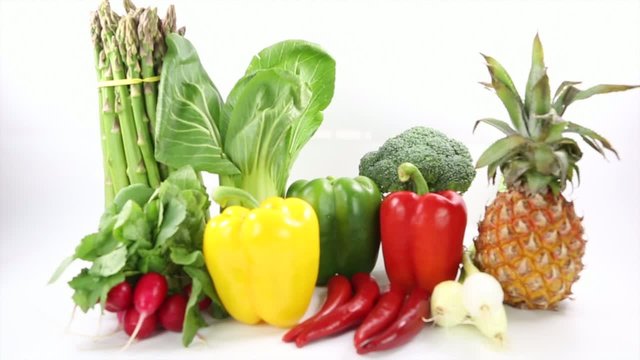 A group of vegetables over white background