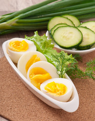 Boiled eggs on white plate