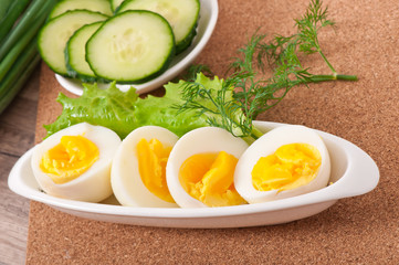 Boiled eggs on white plate