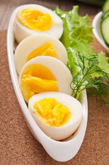Boiled eggs on white plate