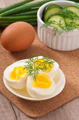 Boiled eggs on white plate