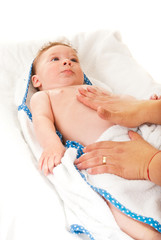 Fototapeta na wymiar Mother massaging baby tummy