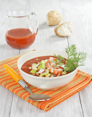 Cold soup with shrimp, vegetables and tomato juice