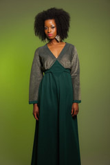 Naklejka premium Sensual retro seventies fashion afro woman with green dress. Gre