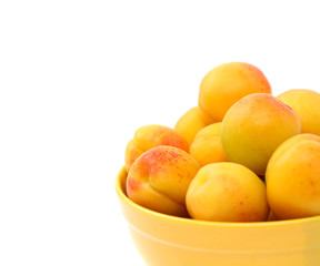 fresh apricot on a bowl