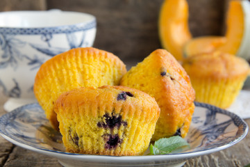 Pumpkin muffins with blueberries.
