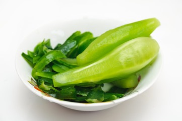 Clean green cucumbers on a plate. Vegetarian healthy food