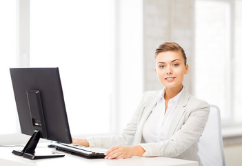 businesswoman with computer in office
