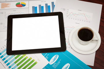 empty tablet and a cup of coffee in office