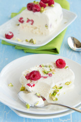Yoghurt Semifreddo with raspberry and pistachio.