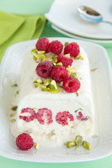 Yoghurt Semifreddo with raspberry and pistachio.