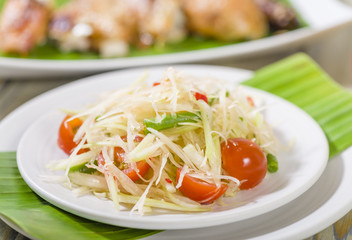 Som Tam  Kai Yang - Green Papaya Salad & BBQ Chicken.