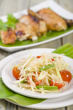 Som Tam  Kai Yang - Green Papaya Salad & BBQ Chicken.