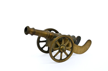 Ancient cannon on wheels isolated on white