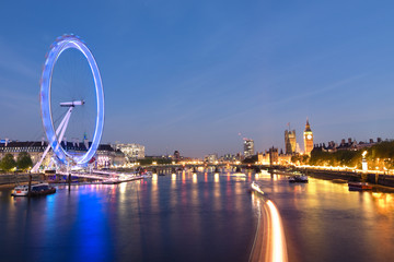 Naklejka premium London Eye And Big Ben On The Banks Of Thames River At Twilight