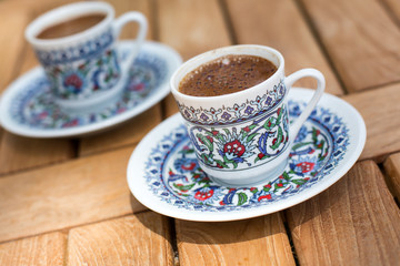 Traditional fresh turkish coffee on wooden table