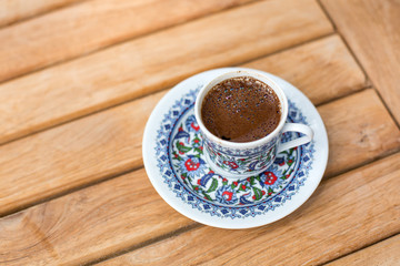 Traditional fresh turkish coffee on wooden table