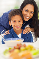 mother and son at breakfast table